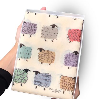 hand printed scarf with colourful sheep on presented in a gift box with free personalisation