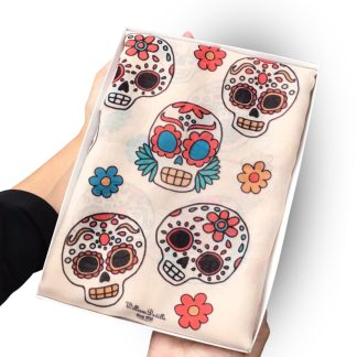 hand printed scarf with sugar skulls on presented in a gift box with free personalisation