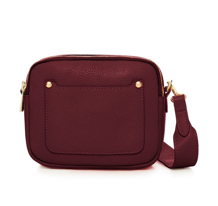 Burgundy Crossbody Bag with two separate zipped compartments, and a detachable strap