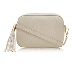 Cream Crossbody Bag Single Zip. One main compartment with an internal side slip pocket and a detachable strap