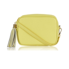 Lemon Yellow Crossbody Bag Single Zip. One main compartment with an internal side slip pocket and a detachable strap