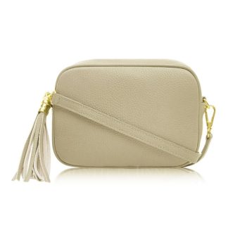 Light Taupe Crossbody Bag Single Zip. One main compartment with an internal side slip pocket and a detachable strap