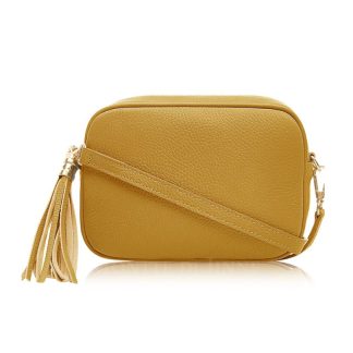 Mustard Crossbody Bag Single Zip. One main compartment with an internal side slip pocket and a detachable strap